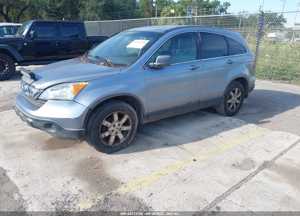 2009 HONDA CR-V VIN: JHLRE38749C004076