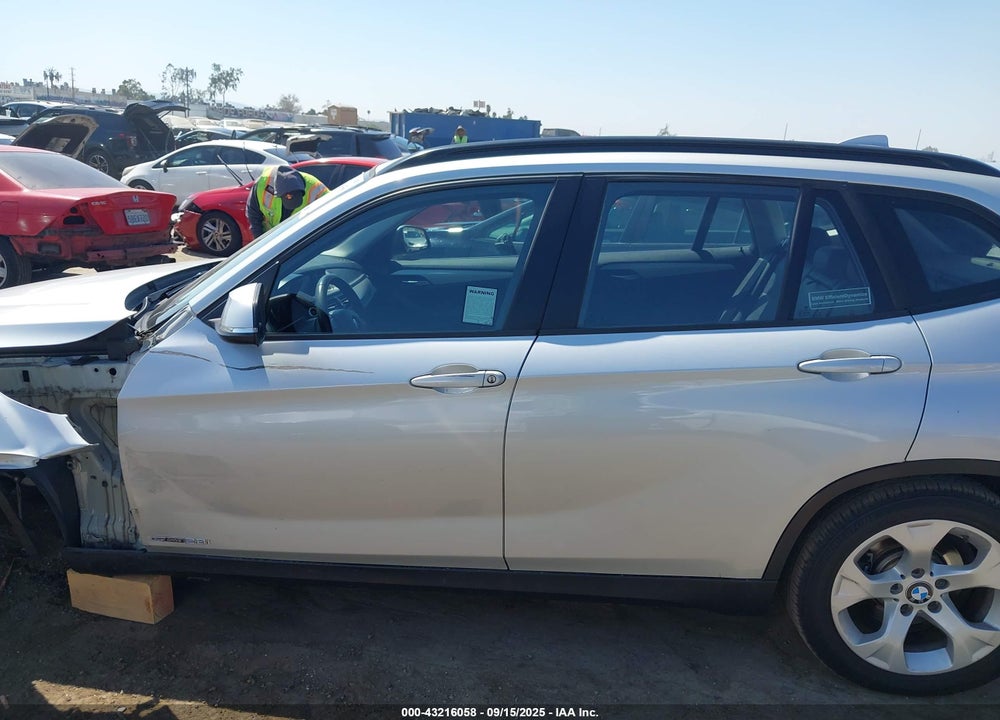 2015 BMW X1 VIN: WBAVM1C50FV497731