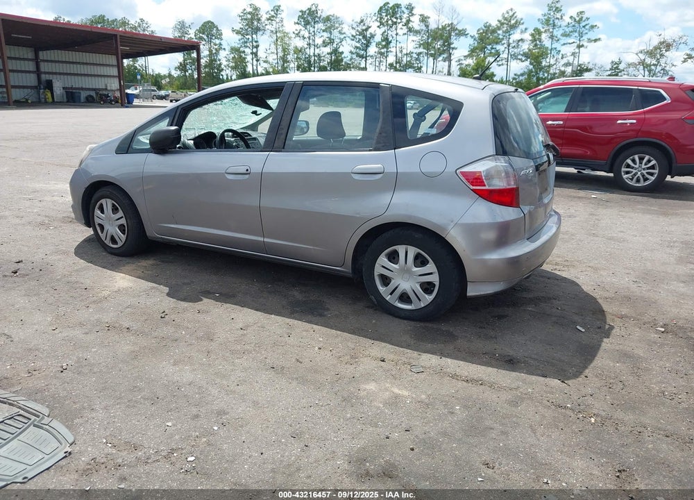 2009 HONDA FIT VIN: JHMGE88239S012583
