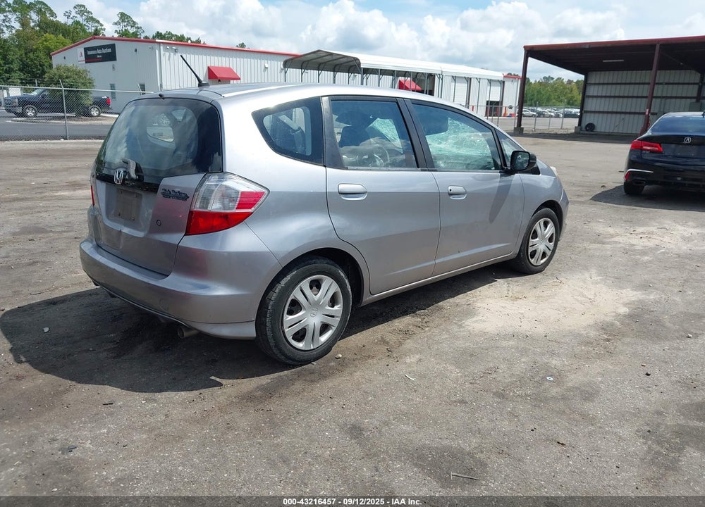 2009 HONDA FIT VIN: JHMGE88239S012583