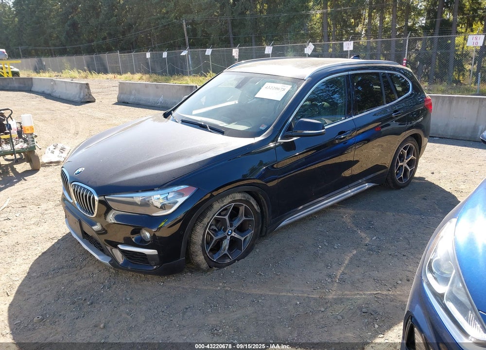 2018 BMW X1 VIN: WBXHU7C38J5L09762