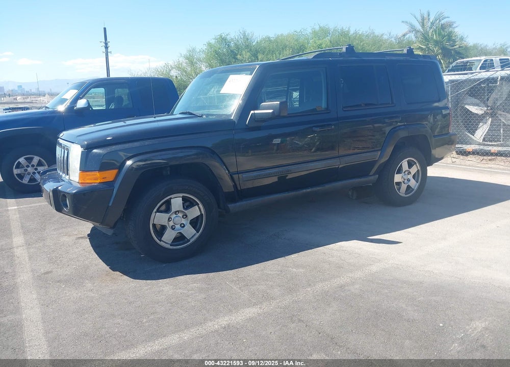 2009 JEEP COMMANDER VIN: 1J8HH48K99C500235