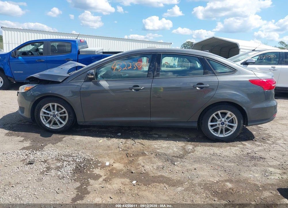 2016 FORD FOCUS VIN: 1FADP3F21GL373621