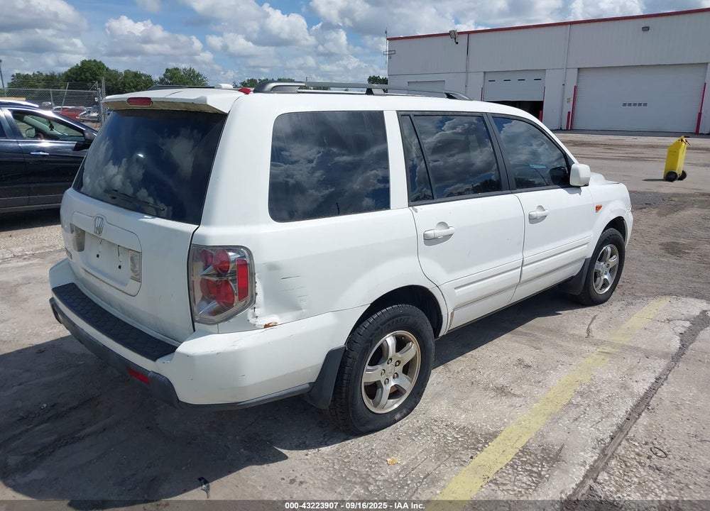 2007 HONDA PILOT EX-L VIN: 5FNYF285X7B021429