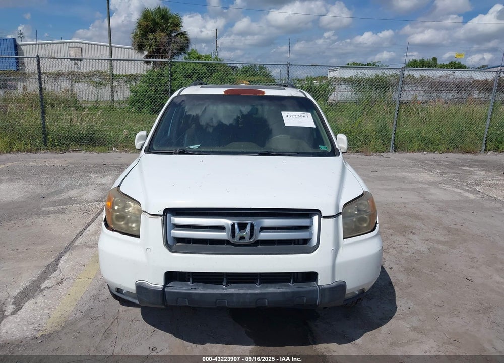 2007 HONDA PILOT EX-L VIN: 5FNYF285X7B021429