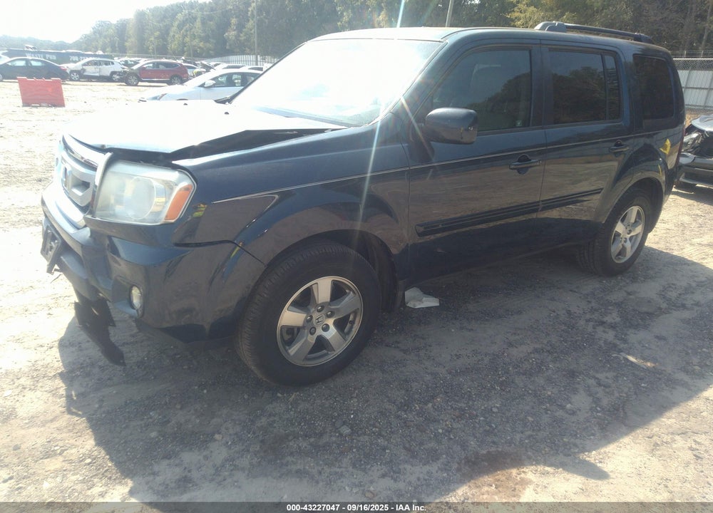 2011 HONDA PILOT EX-L VIN: 5FNYF3H55BB007310