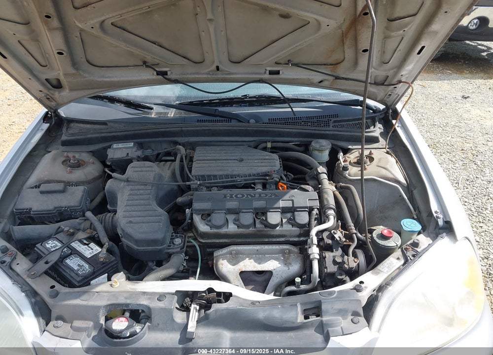 2002 HONDA CIVIC LX VIN: 1HGEM22572L019940
