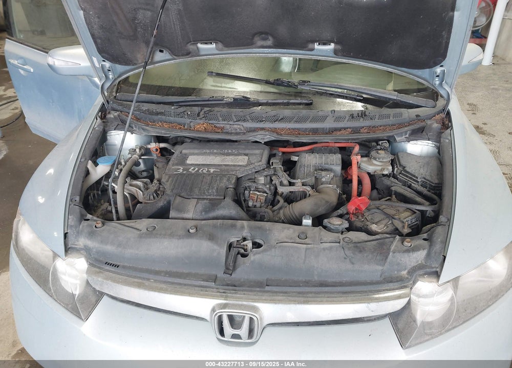 2007 HONDA CIVIC HYBRID VIN: JHMFA36207S015354