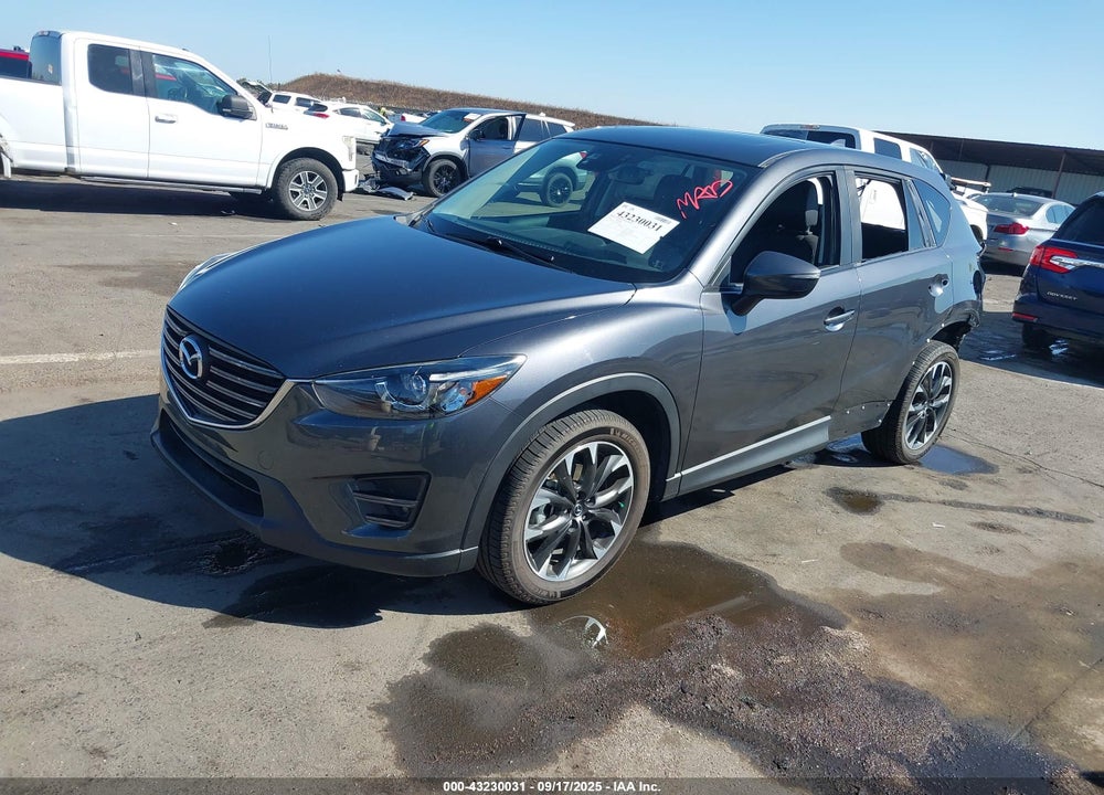 2016 MAZDA CX-5 GRAND TOURING VIN: JM3KE4DY1G0864395
