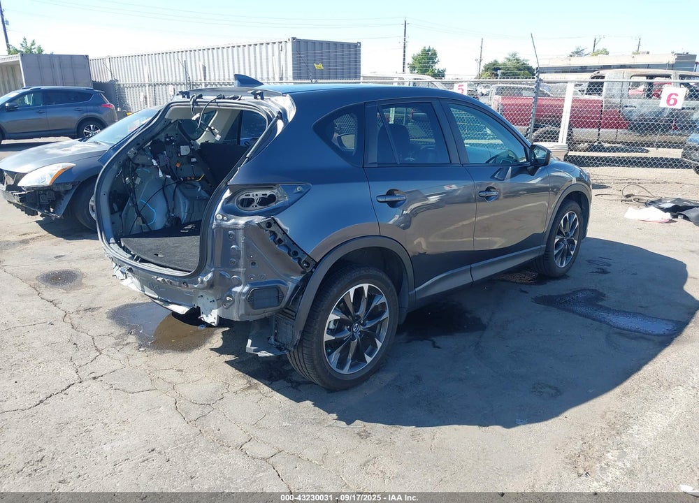 2016 MAZDA CX-5 GRAND TOURING VIN: JM3KE4DY1G0864395