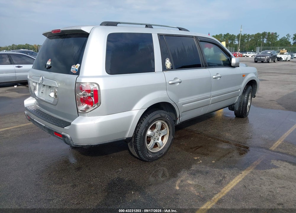 2006 HONDA PILOT EX-L VIN: 5FNYF28716B009427