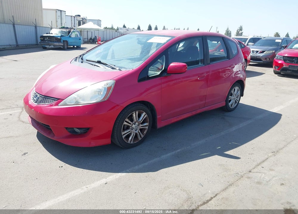 2009 HONDA FIT VIN: JHMGE88489S043863