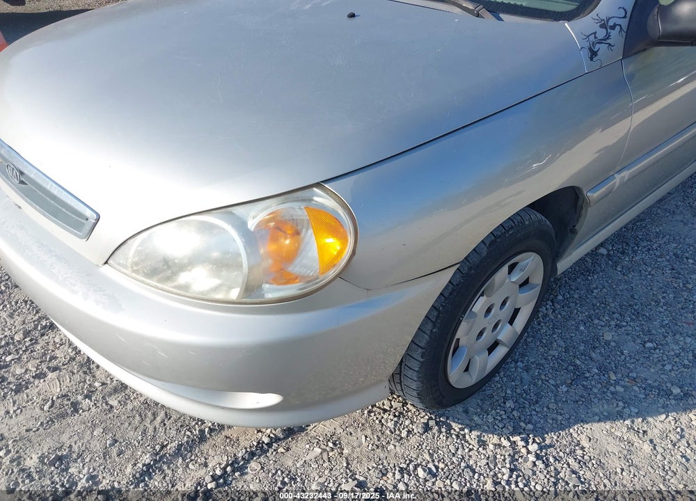2002 KIA RIO CINCO VIN: KNADC163X26079660