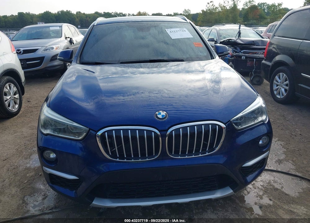2018 BMW X1 VIN: WBXHT3C30J5K27018