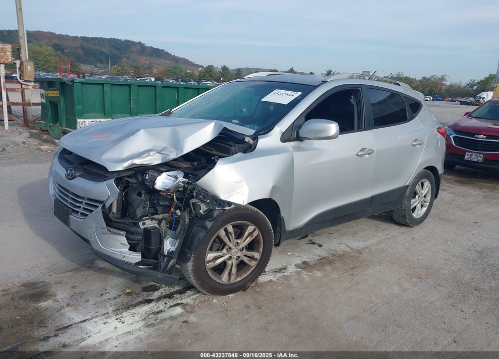 2010 HYUNDAI TUCSON VIN: KM8JUCAC1AU077176