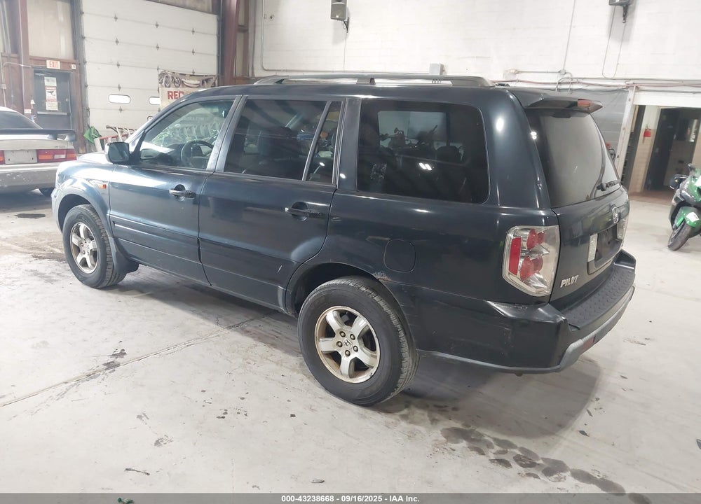 2006 HONDA PILOT EX-L VIN: 2HKYF18526H536841