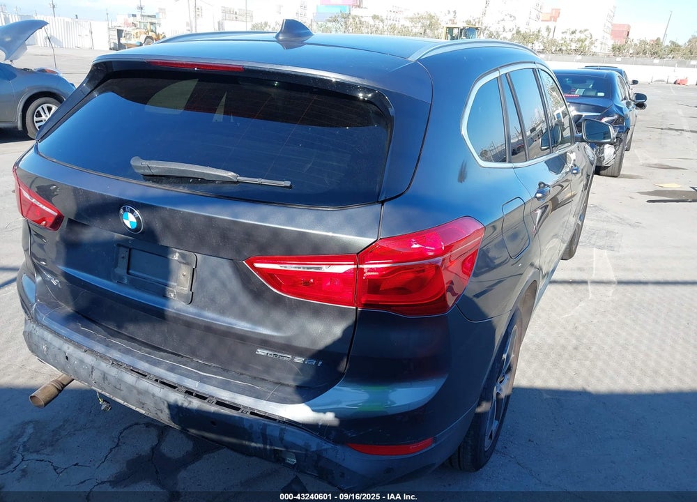 2018 BMW X1 VIN: WBXHU7C30J3H42720