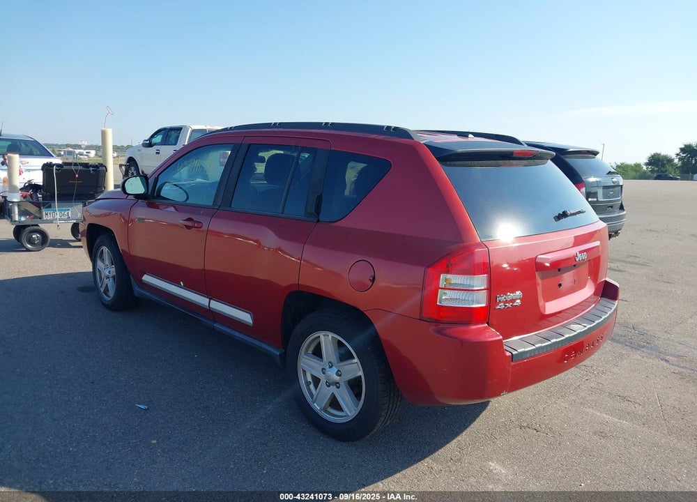 2010 JEEP COMPASS VIN: 1J4NF1FB0AD620094