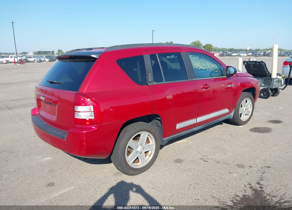 2010 JEEP COMPASS VIN: 1J4NF1FB0AD620094