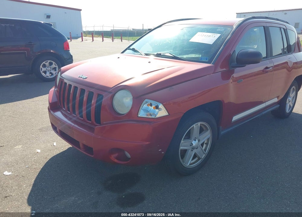 2010 JEEP COMPASS VIN: 1J4NF1FB0AD620094