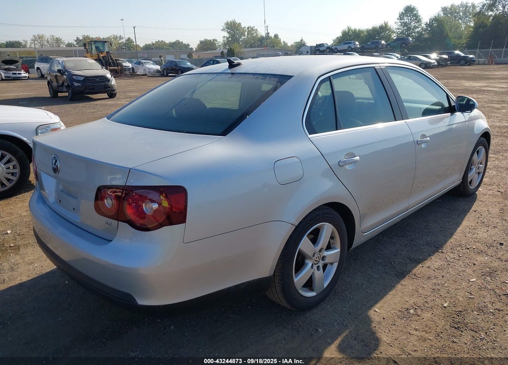 2009 VOLKSWAGEN JETTA VIN: 3VWRM71K99M180008