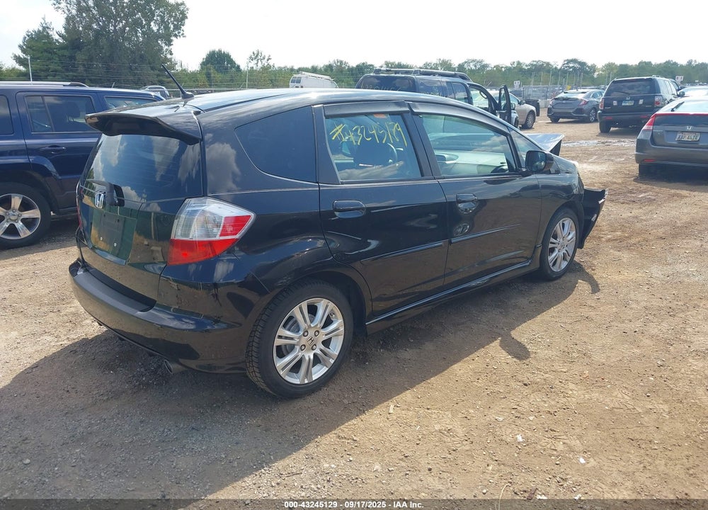 2009 HONDA FIT VIN: JHMGE88639S019309