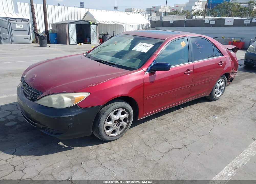 2002 TOYOTA CAMRY LE VIN: JTDBE32K020111659