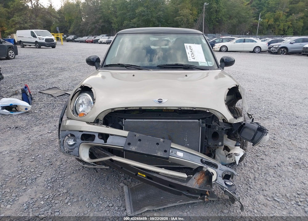 2009 MINI COOPER VIN: WMWMF33519TU75139