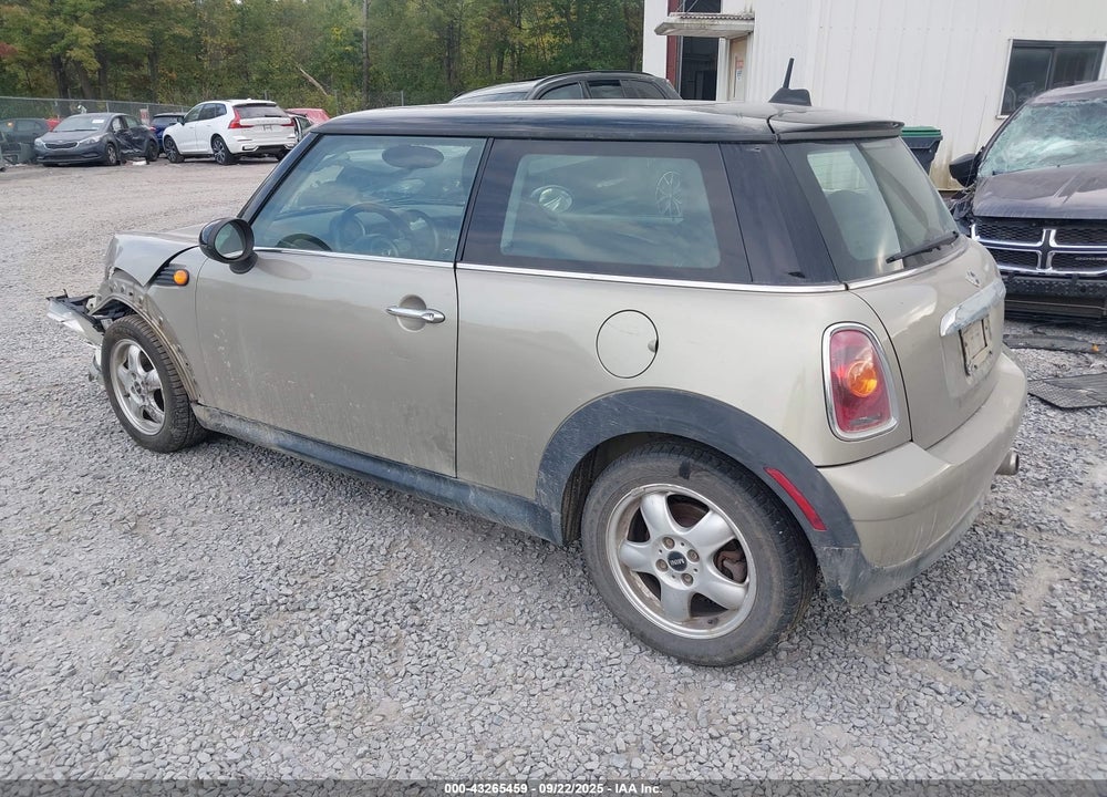 2009 MINI COOPER VIN: WMWMF33519TU75139