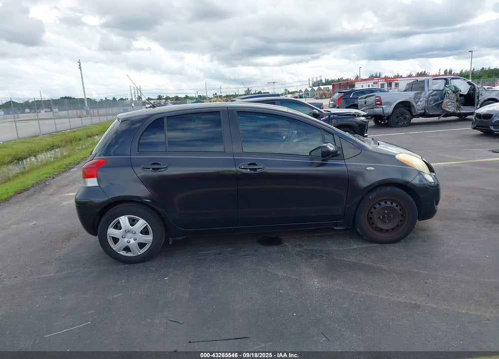 2009 TOYOTA YARIS VIN: JTDKT903395254218