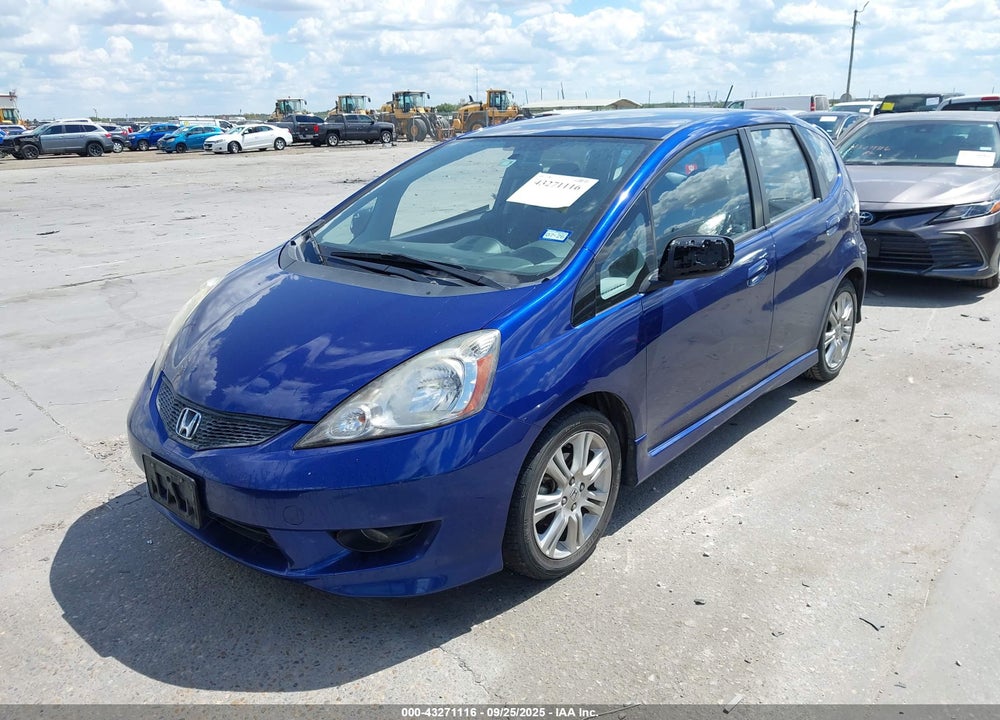 2009 HONDA FIT VIN: JHMGE87459C004482