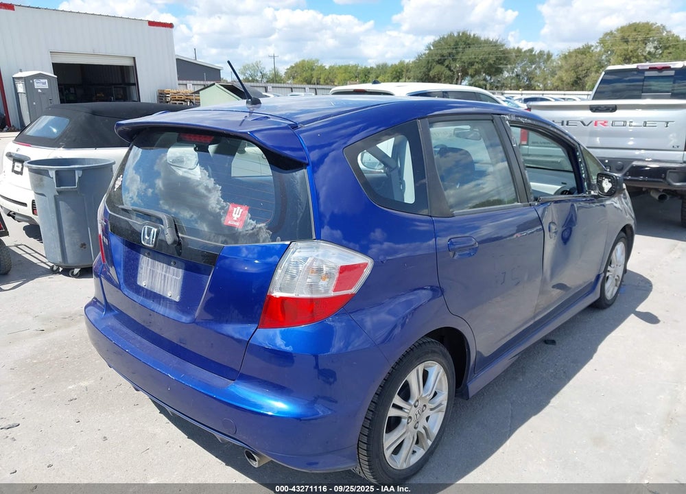 2009 HONDA FIT VIN: JHMGE87459C004482