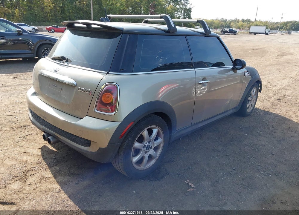 2009 MINI COOPER VIN: WMWMF73549TW87234