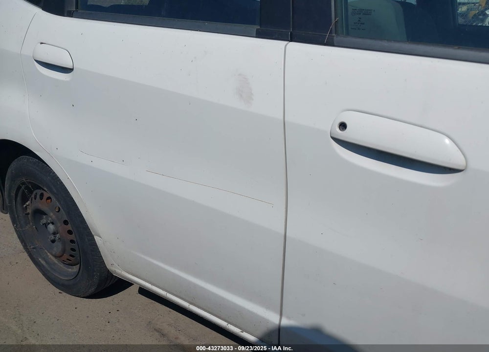2009 HONDA FIT VIN: JHMGE88269S065553