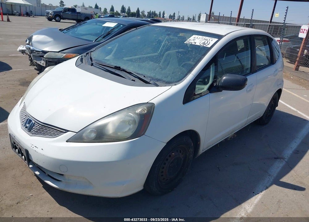 2009 HONDA FIT VIN: JHMGE88269S065553