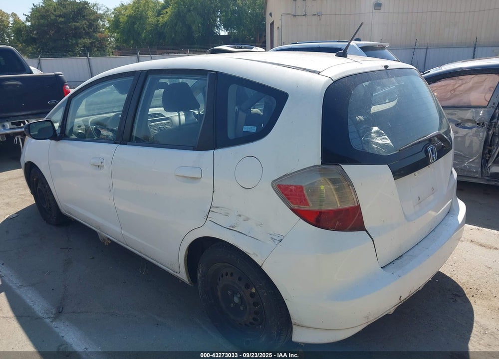 2009 HONDA FIT VIN: JHMGE88269S065553