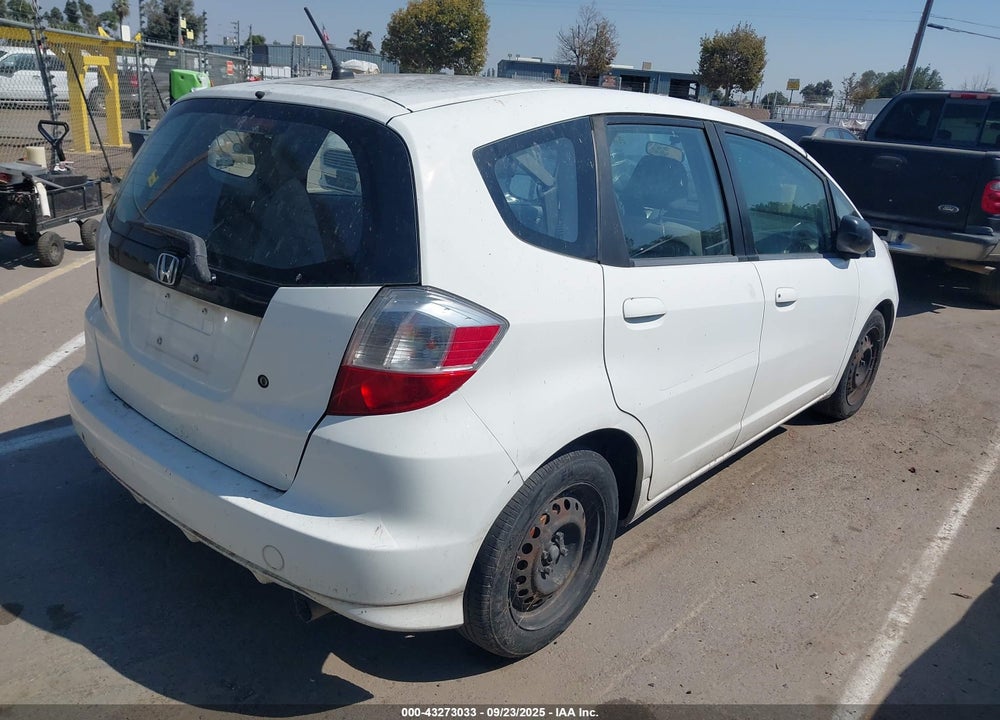2009 HONDA FIT VIN: JHMGE88269S065553