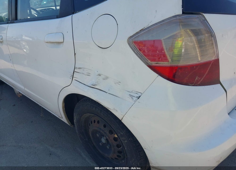 2009 HONDA FIT VIN: JHMGE88269S065553