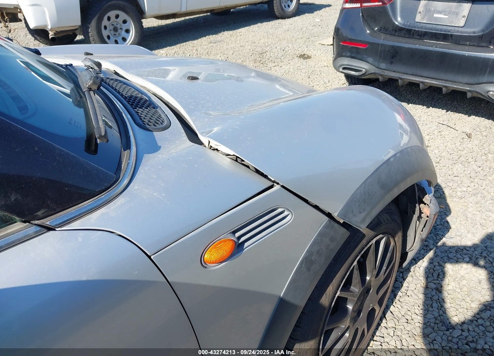 2006 MINI COOPER VIN: WMWRC33566TK67106