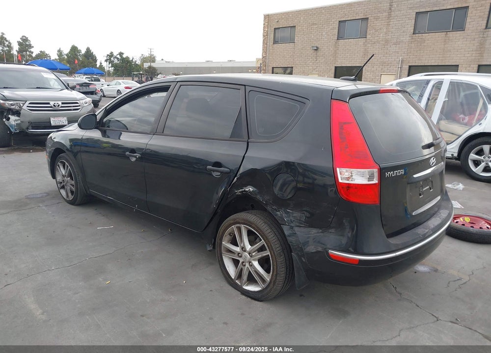 2009 HYUNDAI ELANTRA TOURING VIN: KMHDC86E59U031434