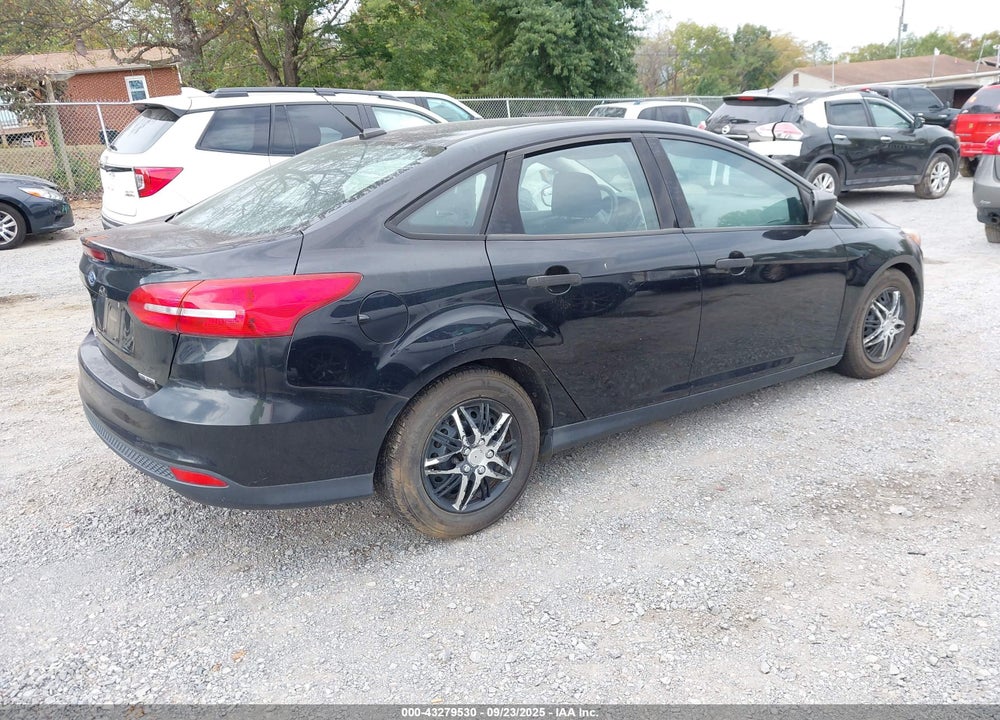 2016 FORD FOCUS VIN: 1FADP3E21GL402570