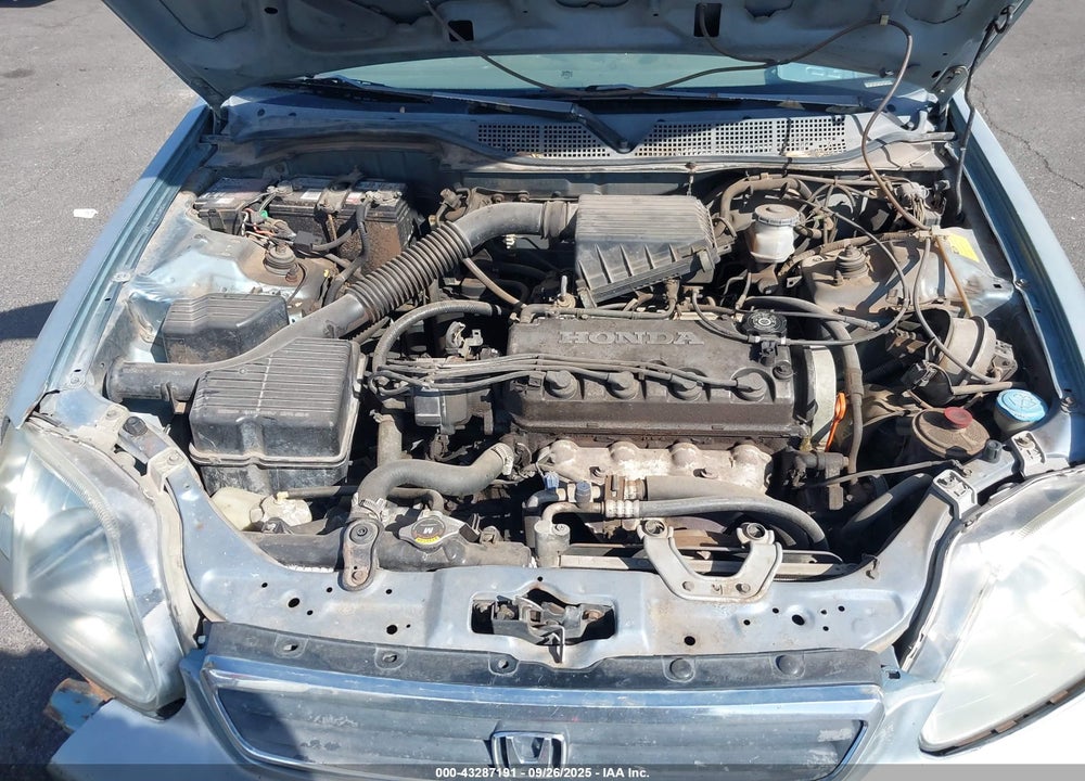 1999 HONDA CIVIC LX VIN: 1HGEJ6676XL057999