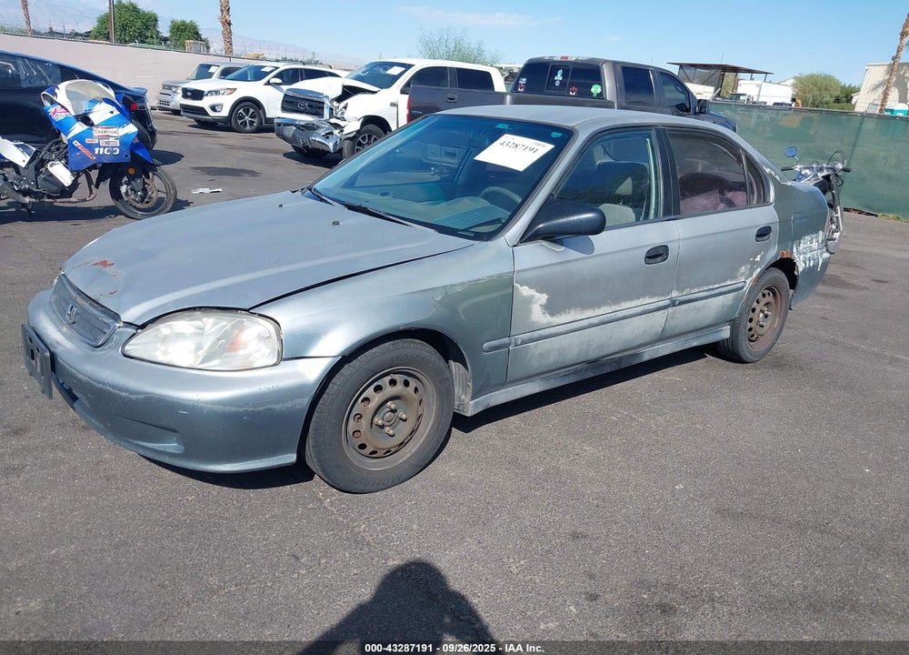1999 HONDA CIVIC LX VIN: 1HGEJ6676XL057999