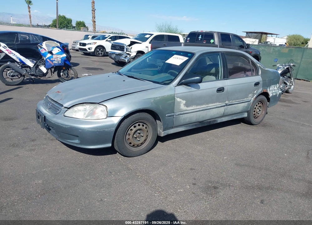 1999 HONDA CIVIC LX VIN: 1HGEJ6676XL057999