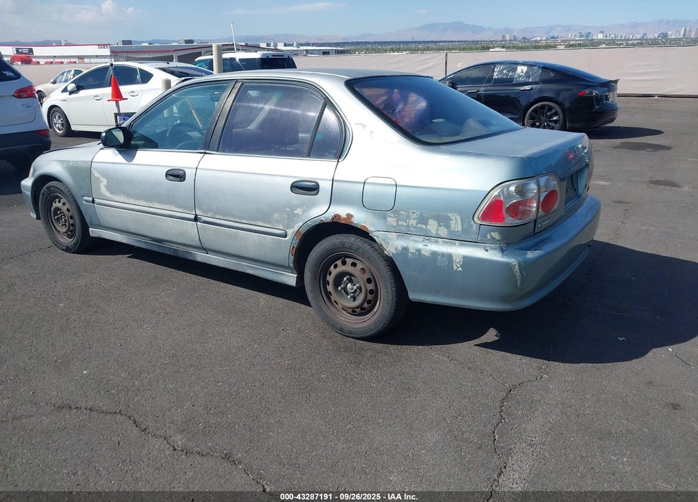 1999 HONDA CIVIC LX VIN: 1HGEJ6676XL057999