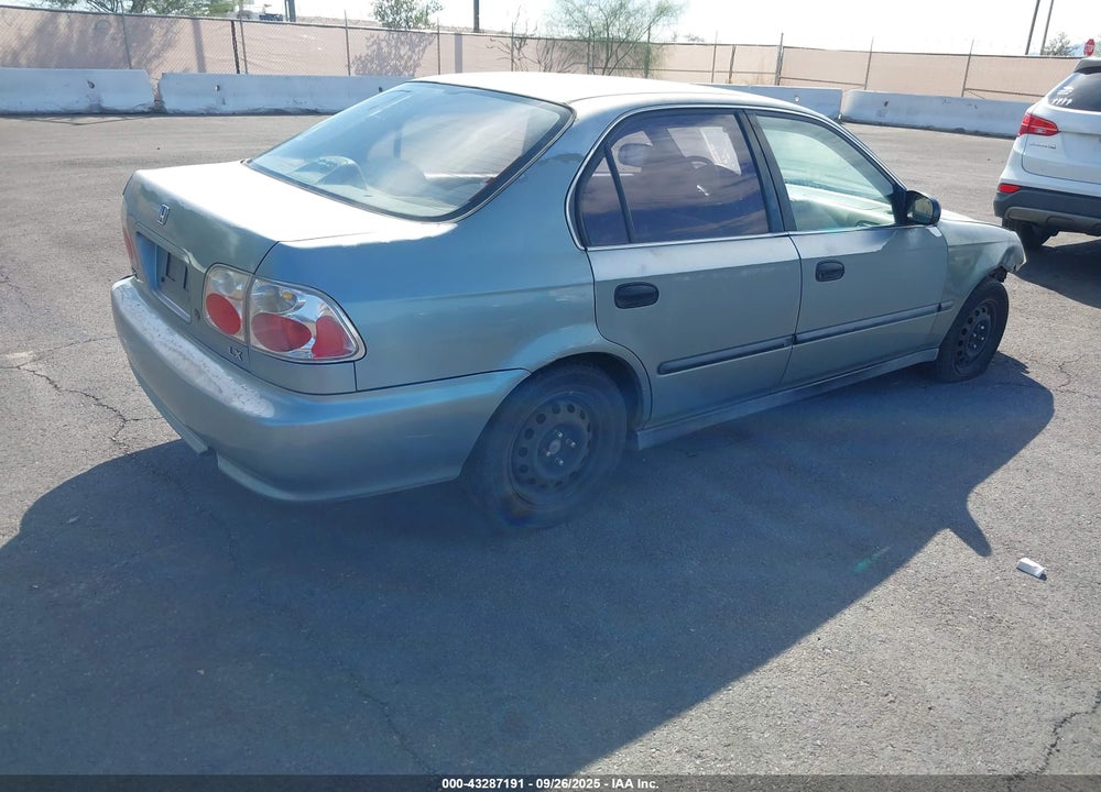 1999 HONDA CIVIC LX VIN: 1HGEJ6676XL057999