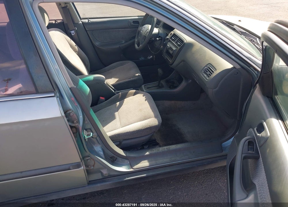1999 HONDA CIVIC LX VIN: 1HGEJ6676XL057999