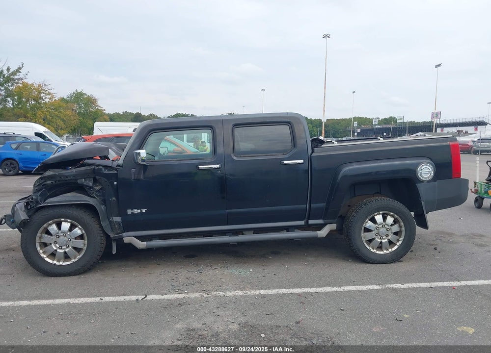 2009 HUMMER H3T VIN: 5GNEN13E898128599