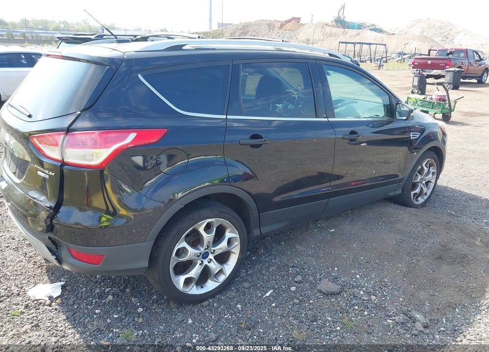 2016 FORD ESCAPE TITANIUM VIN: 1FMCU9J90GUC16559
