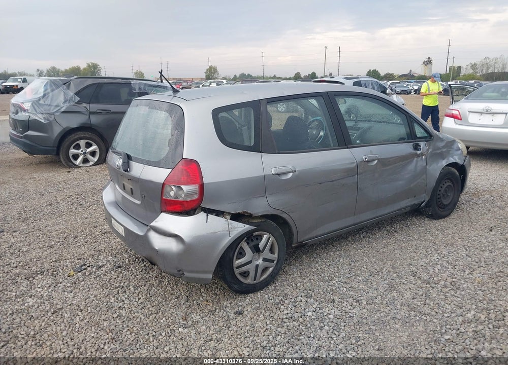 2007 HONDA FIT VIN: JHMGD38417S013512